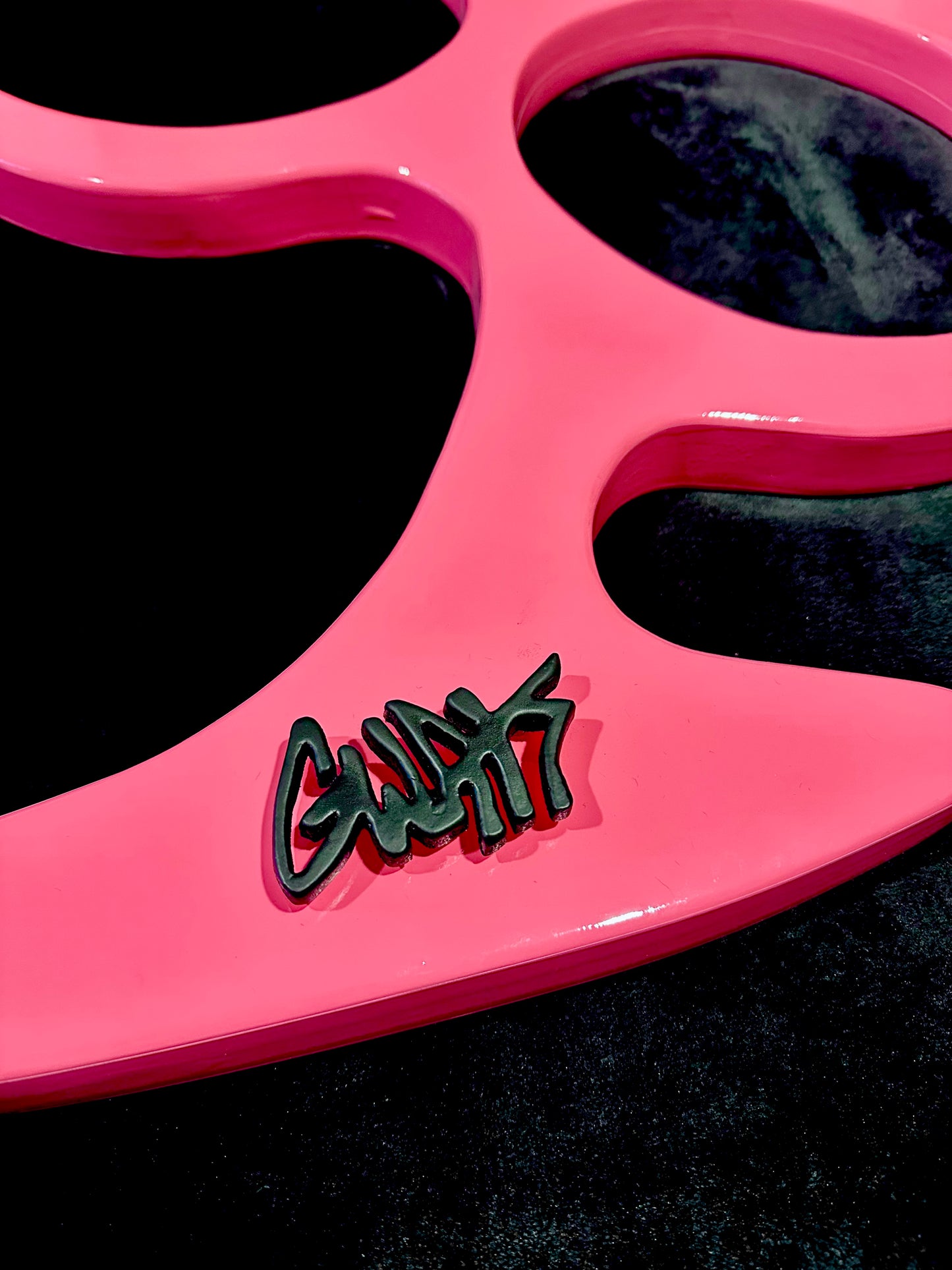 GIANT PINK BRASS KNUCKLES